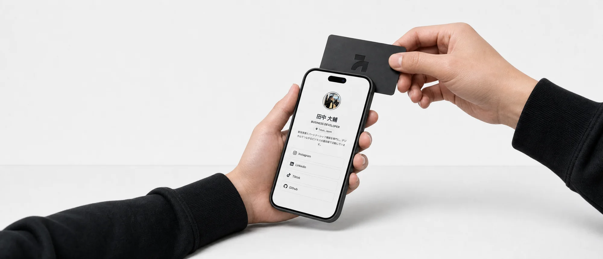 Tapping the AnimaNext card to the back of a phone